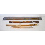 A quantity of split cane fly fishing rods and salmon rods with cases including a Hardy case