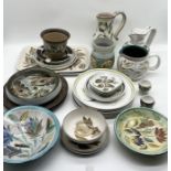 A large collection of Denby and Bourne Denby stoneware vases, plates, bowls and jugs including