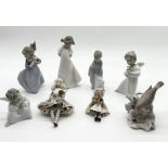 A collection of Nao, Lladro and Ann Legg figures