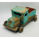 A hand-built wooden toy truck