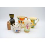 A small quantity of pottery including Art Deco jugs etc.