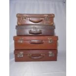 Four vintage worn leather suitcases. Largest 45cm x 29cm x 12cm.