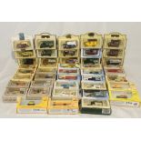 A collection of boxed die-cast vehicles including Lledo Days Gone, Poston, Posti, Lledo