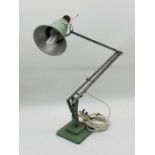 A vintage Herbert Terry angle poise lamp