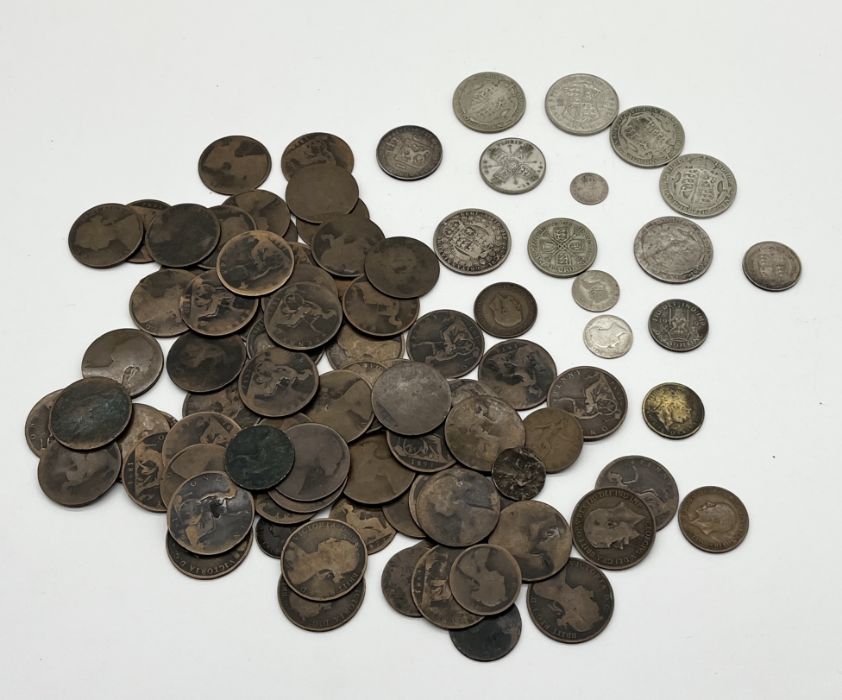 A collection of various pre-decimal coinage including some silver including, George III shilling,