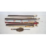 A small collection of mainly antique fly fishing rods with cases including a three piece E R