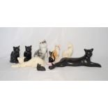 A collection of cat ornaments including The Leonardo Collection