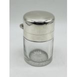 A hallmarked silver dressing table pot from Goldsmiths Company