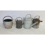 Three vintage galvanised watering cans, along with galvanised bucket