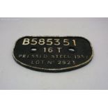 A vintage cast iron railway wagon plate.