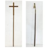 A brass church candle snuffer on tapered handle along with a long handled cross inscribed "