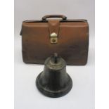 A vintage bell (diameter 21.5cm) along with a leather briefcase (with key)