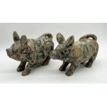 Two papier maché pigs finished with comic book design