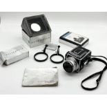 A Hasselblad 500C camera with Carl Zeiss planar 1:2.8 F+80mm lens no. 4595461 along with a boxed