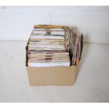 A quantity of 7" vinyl records including Eddie Cochran, Joan Baez, Roy Orbison, Duane Eddy, Group X,