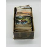 A box of vintage postcards