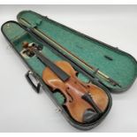 A cased violin (A/F) with ebony fingerboard with label for "Nicolaus Amatus Fecit In Cremona 1646"