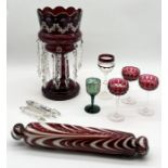 A Victorian ruby glass lustre along with a collection of bohemian glass goblets and red and clear