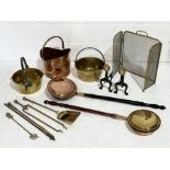 A collection of brass and copper including coal bucket, fire dogs, fire screen etc.