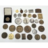 A collection of various 19th century tokens and medallions including a number of French examples