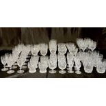 A large collection of cut glass including tumblers, wine glasses, sherry glasses etc.