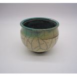 A small Raku pottery bowl. Height 11cm
