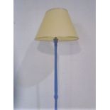 A vintage wooden painted standard lamp with shade. Height 154cm (minus shade).