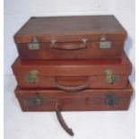 Three vintage leather suitcases (A/F)