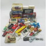 A collection of boxed and unboxed die-cast vehicles including Matchbox Models of Yesteryear, Oxford,