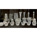 A collection of various cut glass including decanters, vases, sundae dishes, perfume bottle etc.