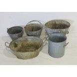 A collection of vintage galvanised items including buckets, small baths, bucket etc