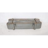 A grey painted wooden ammunition crate
