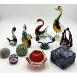 A collection of various art glass and paperweights including Murano Summerso bowl