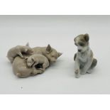 Two Lladro figures in the form animals comprising of a sow with two piglets and a dog