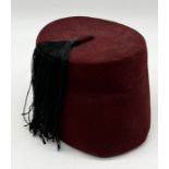 A vintage Fez hat made by El-Hag Ahmed Serag, Cairo