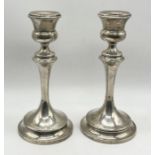 A pair of hallmarked silver candlesticks, Birmingham 1919, height 17cm