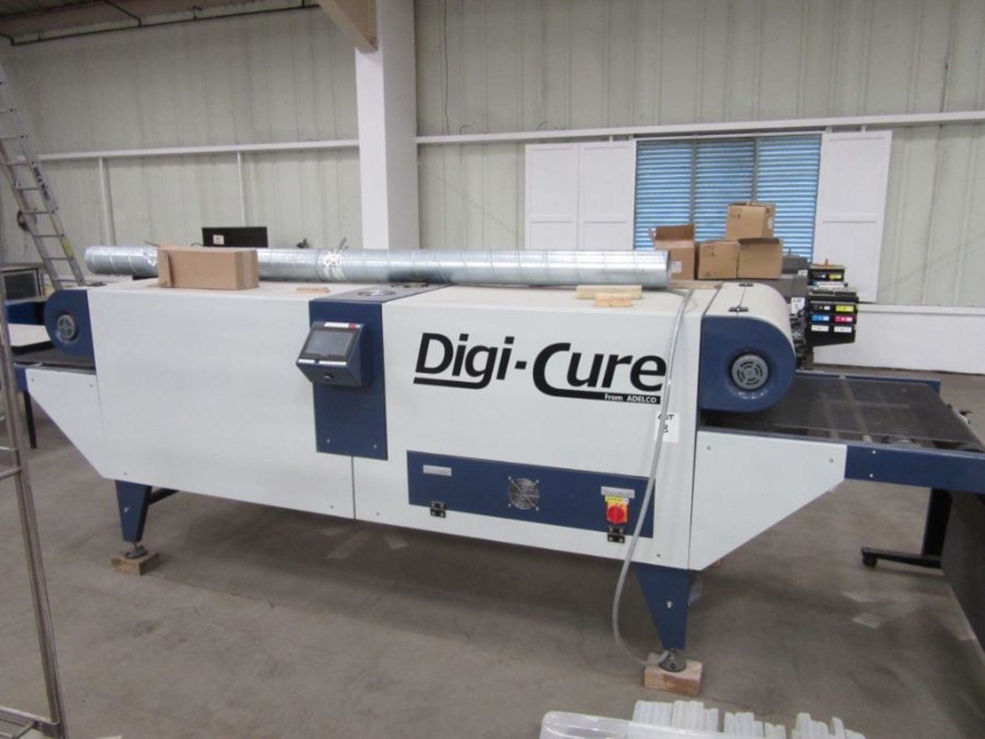 An Adelco Digi-Cure dryer