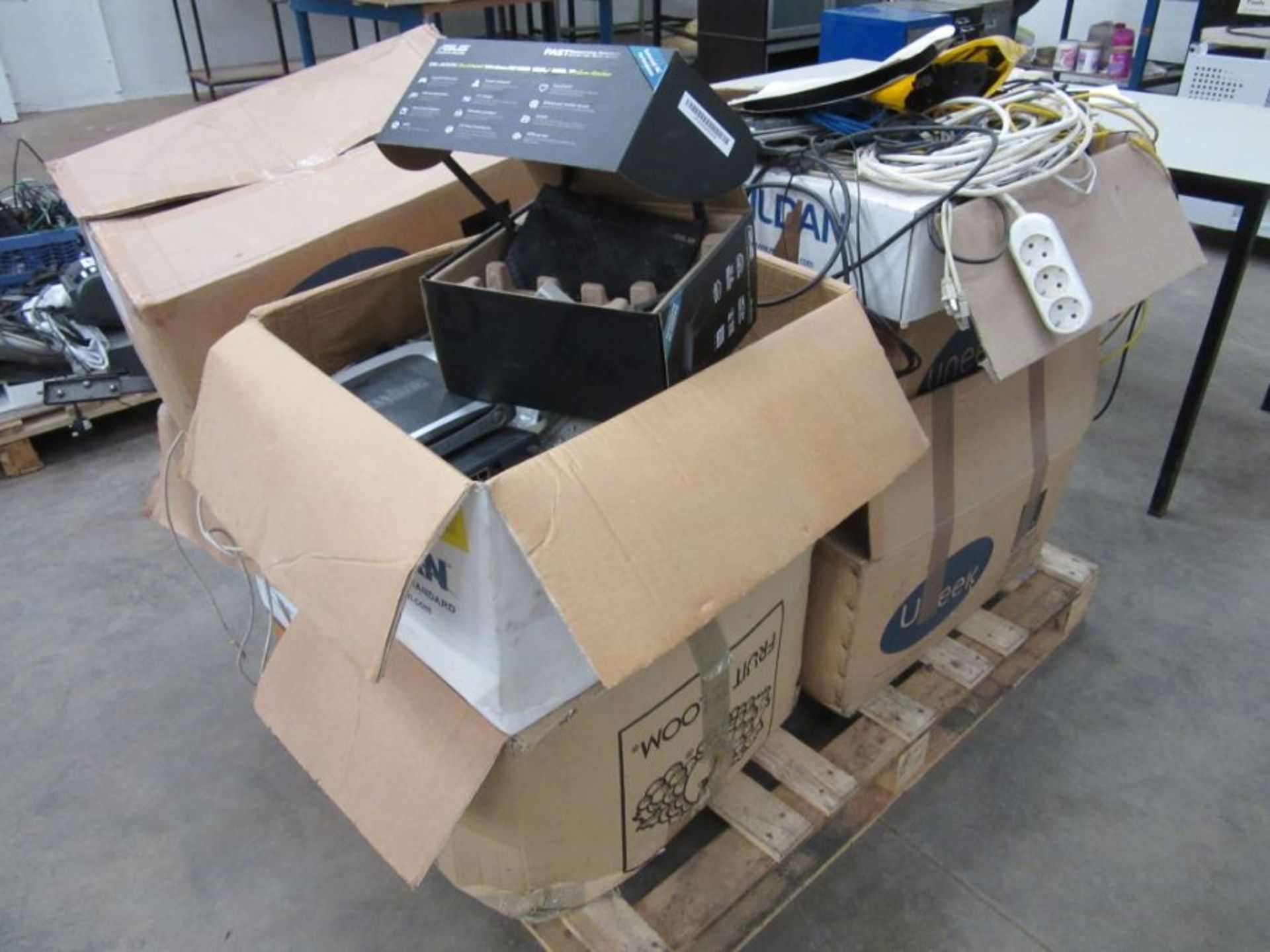 Two pallets of miscellaneous electronic items including a computer tower, cables Philips VR969 video