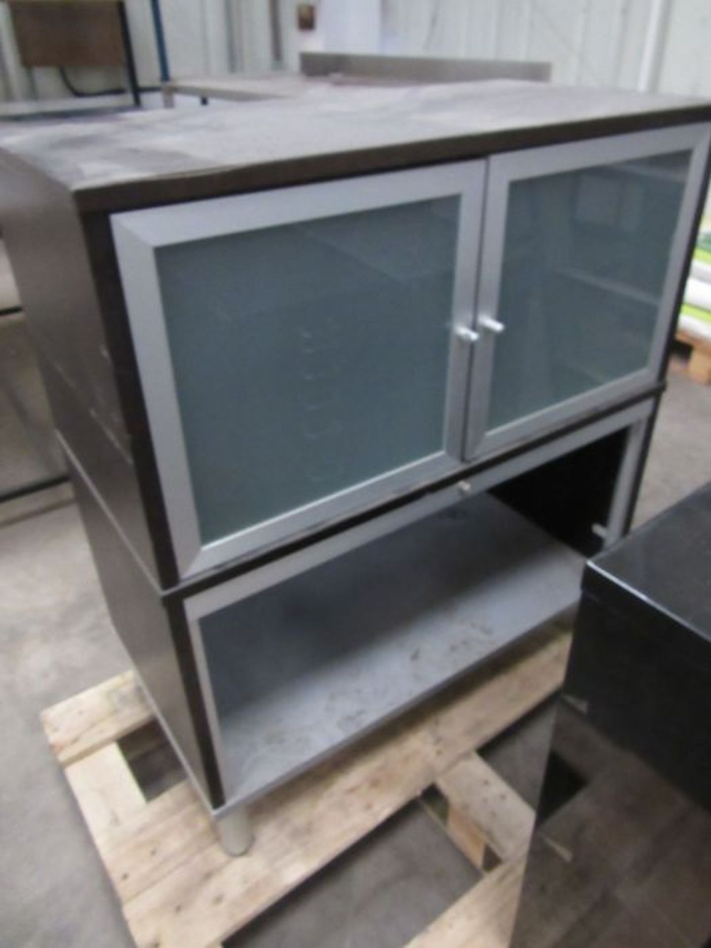 A glass fronted industrial cabinet