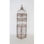 A wrought iron garden plant stand of domed form - diameter 44cm, height 152cm