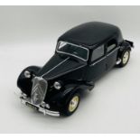 An unboxed Citroen 15 Six "Traction Avant" (1:8 scale) plastic car model in black