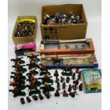 A large collection of various plastic toy figures including boxed Britians American War of