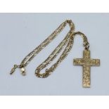 A 9ct gold cross and chain, total weight 7.5g
