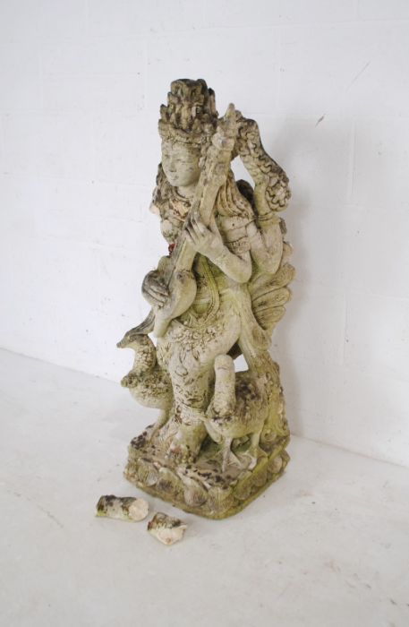 A weathered Balinese lava stone statue of a deity - two pieces loose but present, A/F - height - Image 3 of 8