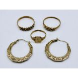 Three 9ct gold rings along with a pair of 9ct hoop earrings, total weight 6.6g