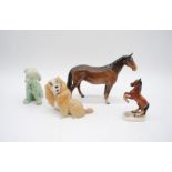A Wade blow up figure of 'Lady' from 'Lady and the Tramp' along with a Beswick horse (A/F) etc.