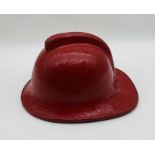 A vintage red firefighters helmet - marked inside medium,1986