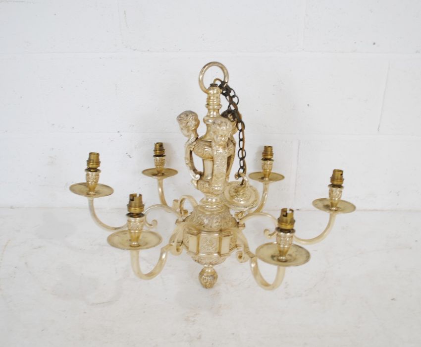 A vintage six branch hanging centre light pendant with cherub decoration