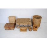 A quantity of wicker baskets including a laundry basket, picnic hamper etc.