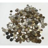 A collection of various coinage including a small amount of silver, 18th century tokens etc.